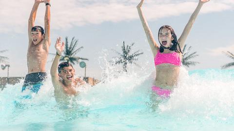 wave pool people having fun in pool